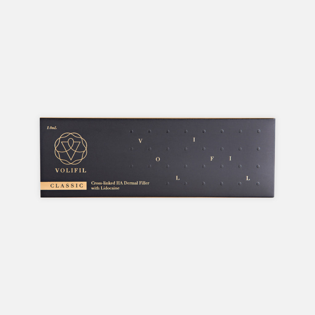 Box of VOLIFIL CLASSIC 1ml dermal filler with product details visible on the packaging. Fine hyaluronic acid dermal filler for fine lines, wrinkles and facial rejuvenation.